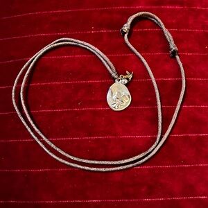 Silver/gold tone Pendant Necklace with charms.